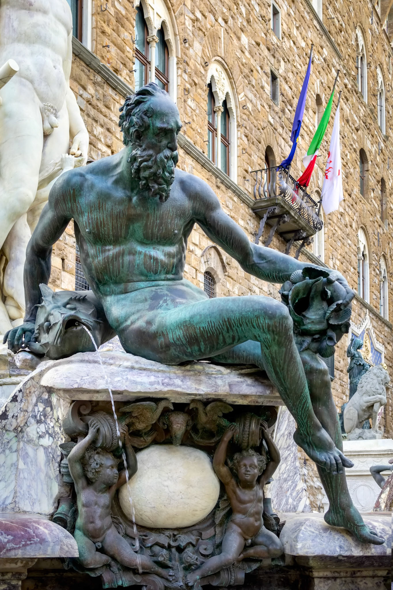 FLORENCE, TUSCANY/ITALY - OCTOBER 19 : Detail from the Fountain of Neptune statue Piazza della Signoria in front of the Palazzo Vecchio Florence on October 19, 2019