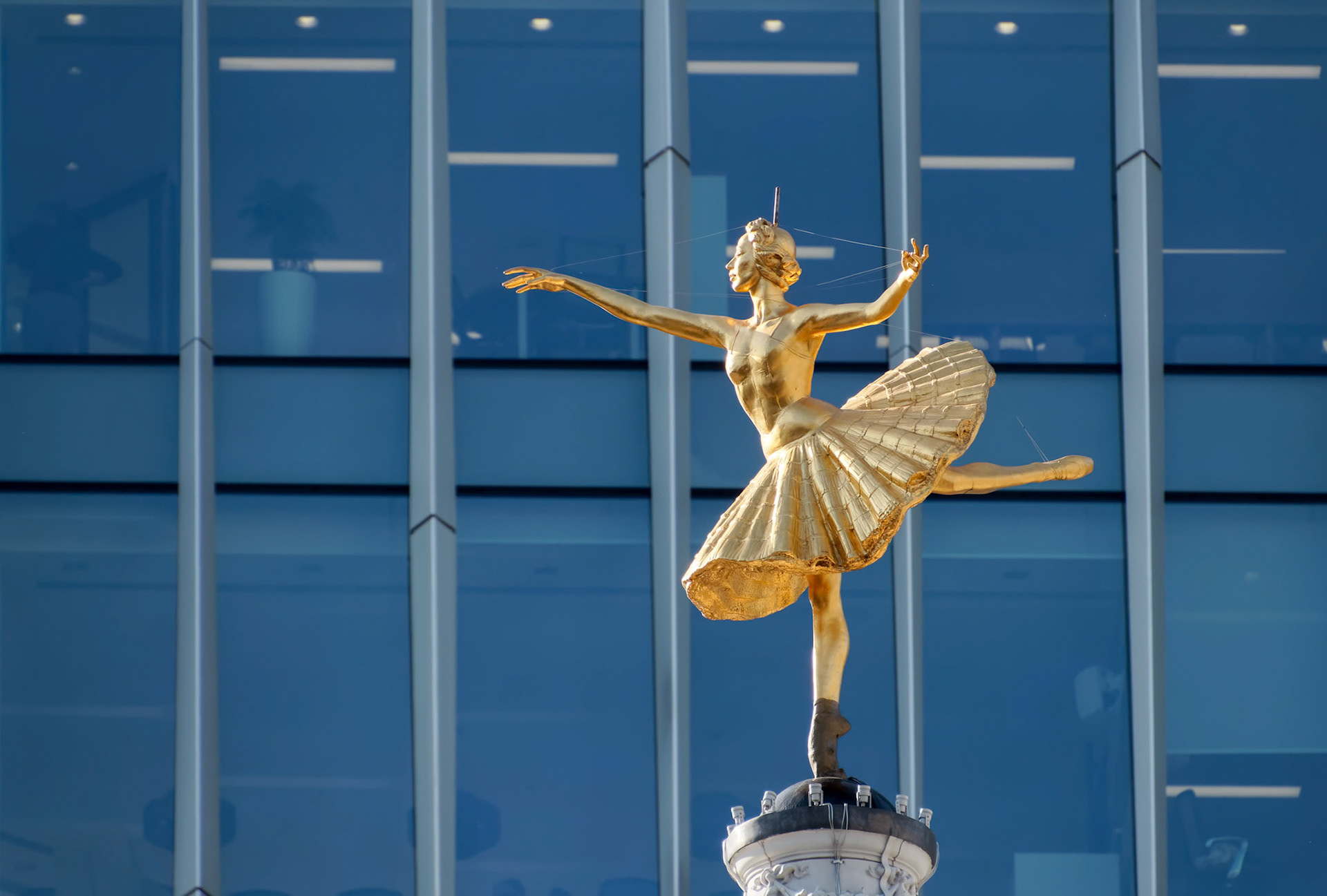 LONDON/UK - MARCH 21 : Replica Statue of Anna Pavlova on the Cupola of the Victoria Palace Theatre in London on March 21, 2018