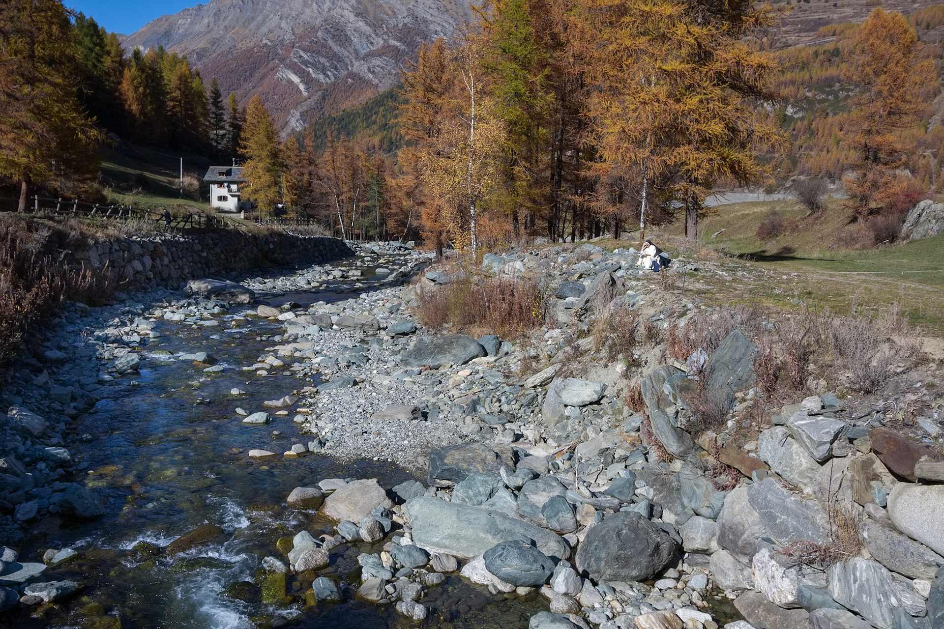 Nun Reading by the River in Cogne Gran Paradiso Park Valle d'Aosta