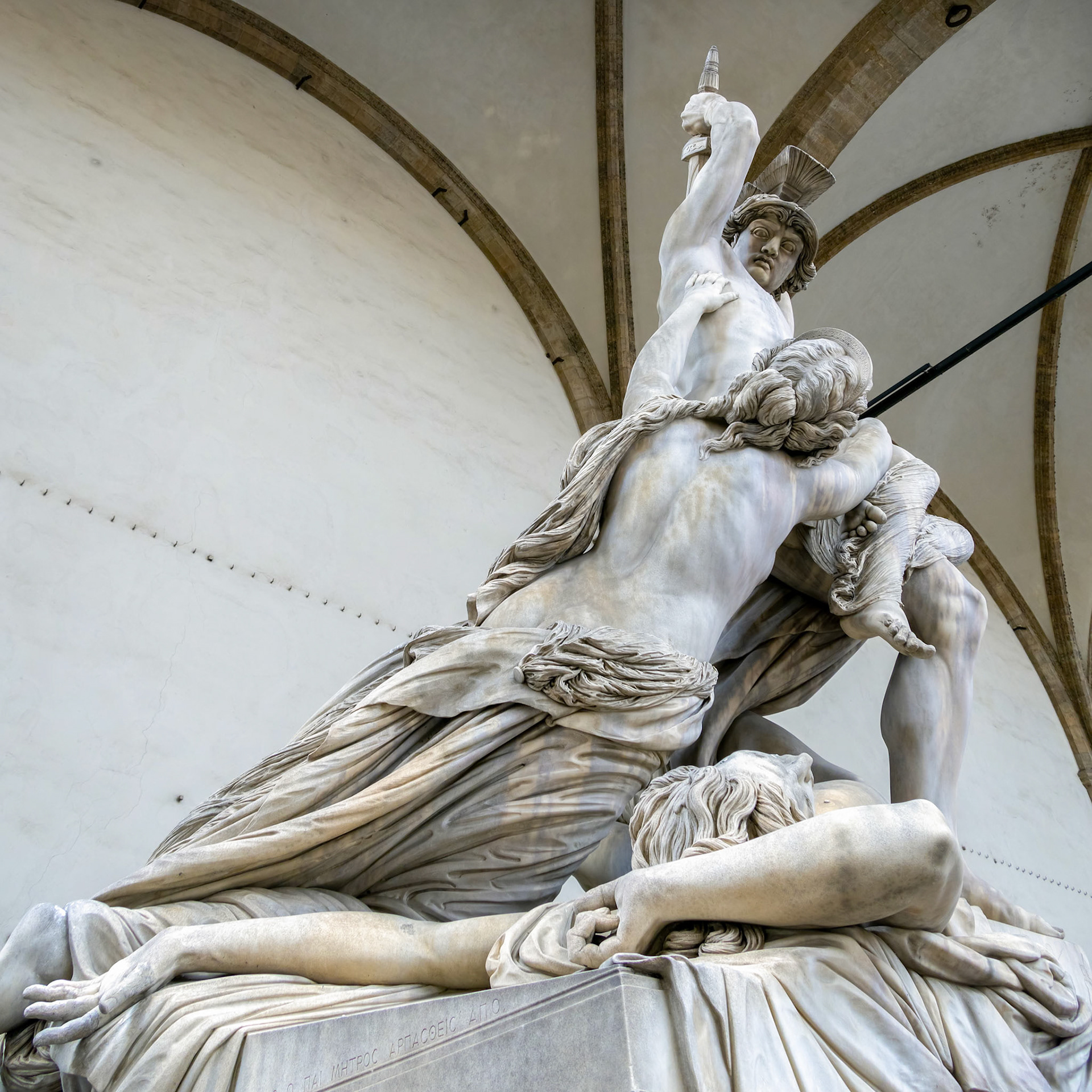 FLORENCE, TUSCANY/ITALY - OCTOBER 19 : Pyrrhus and Polyxena statue, Loggia dei Lanzi, Florence on October 19, 2019