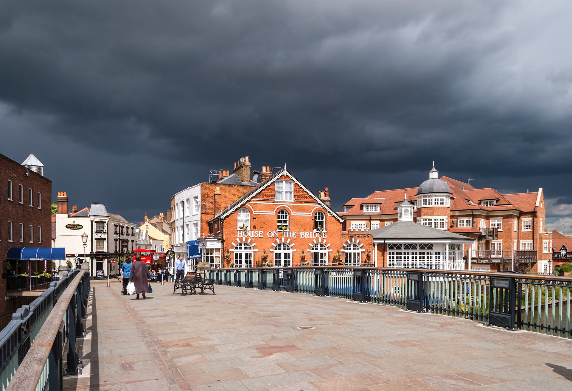 House On The Bridge Public House at Windsor with approaching Storm