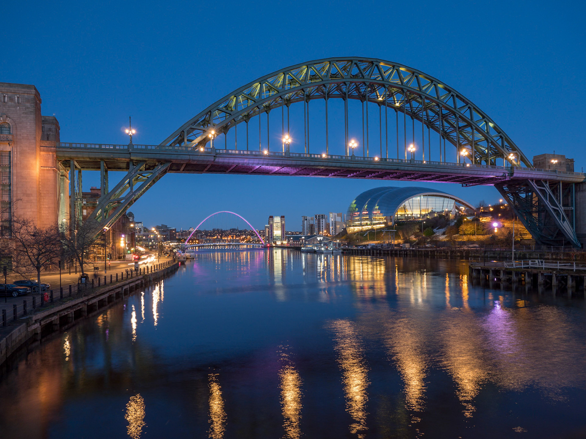 NEWCASTLE UPON TYNE, TYNE AND WEAR/UK - JANUARY 20 : View of the Tyne and Millennium Bridges at dusk in Newcastle upon Tyne, Tyne and Wear on January 20, 2018